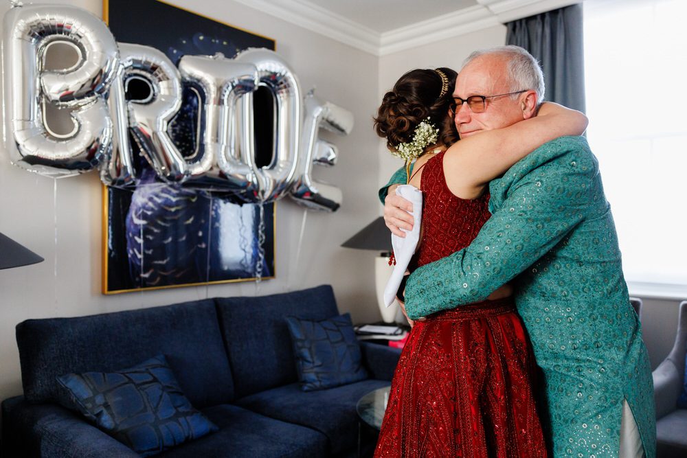 Bride hugging dad