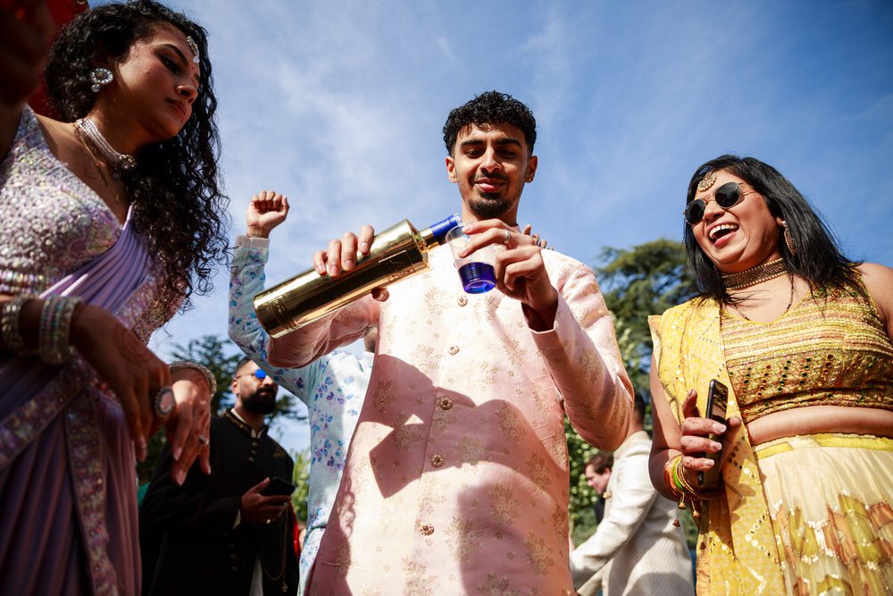 Asian wedding groom arrival