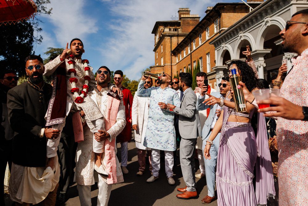 Asian wedding groom arrival