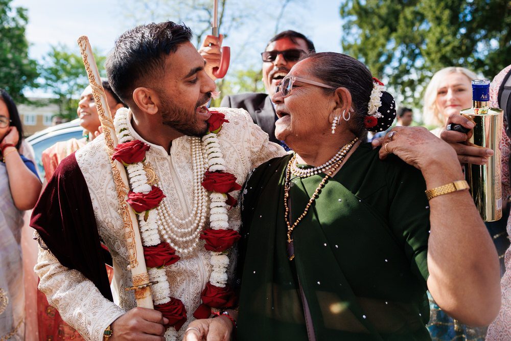 Asian wedding groom arrival