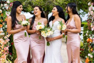 Bride and Bridesmaids laughing