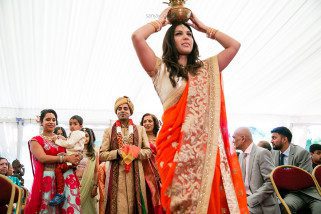 Groom walking to mandap