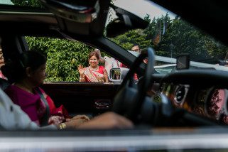 Mother of the bride waving