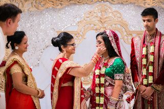 Mother of bride wiping tears