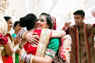 Bride hugging mother