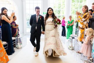 Bride and groom walking down the isle