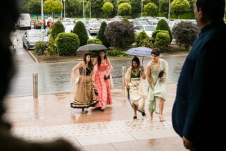 Asian wedding guests arriving at Oshwal centre