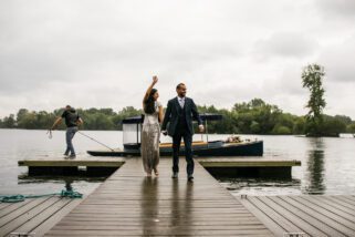 Bride and groom arriving by boat
